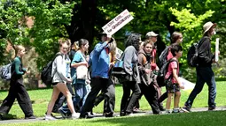 Mereka menuntut adanya tindakan tegas atas perubahan iklim. (William WEST/AFP)