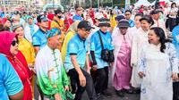 Menko PMK Pratikno belajar Tai Chi di ASEAN Car Free Day, Thamrin Jakarta Pusat, Minggu (14/9/2025).