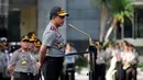 Kapolri Jenderal Tito Karnavian saat menjadi Inspektur apel di halaman Krimsus Polda Metro Jaya, Jakarta, Rabu (18/1). Sebanyak 87 anggota kepolisian dari polda Metro akan mendapat penghargaan. (Liputan6.com/Gempur M Surya)