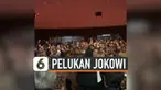 Presiden Joko Widodo berpelukan dengan ketua umum partai Nasdem Surya Paloh pada acara ulang tahun ke-8
partai Nasdem di JI Expo Kemayoran, Jakarta Pusat, Senin (11/11).