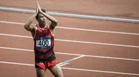 Pelari Indonesia, Lalu Muhammad Zohri, saat berlaga pada nomor 100 meter Asian Games di SUGBK, Jakarta, Minggu (26/8/2018). Lalu Zohri finish di urutan ke tujuh dengan catatan waktu 10,20 detik. (Bola.com/Vitalis Yogi Trisna)