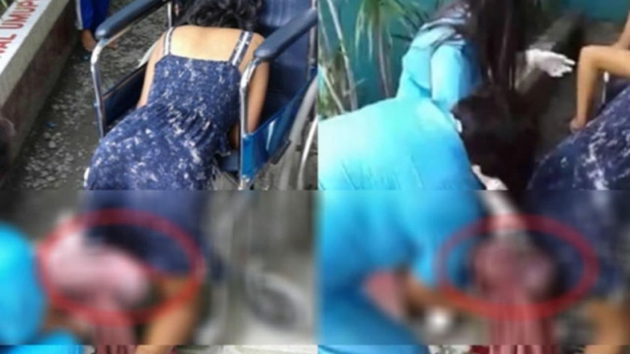 Seorang ibu melahirkan berdiri di depan rumah sakit