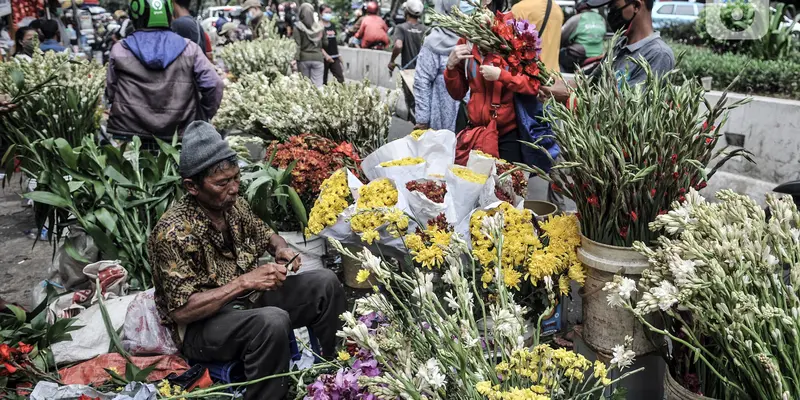 FOTO: Tradisi Warga Tionghoa Berburu Bunga Hias Jelang Imlek