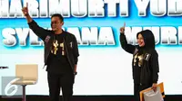 Cagub DKI Jakarta nomor 1 Agus Harimurti Yudhoyono-Sylviana menyapa pendukungnya saat debat kedua Cagub DKI-Jakarta, Jumat (27/1). (Liputan6.com/Faizal Fanani)