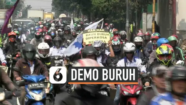 Ribuan buruh Kota Tangerang berkonvoi ke Jakarta bergabung dengan rekan-rekan mereka berdemo ke Jakarta. Personel TNI dan Polri mengamankan sejumlah Tituk yang dilalui oleh konvoi buruh.