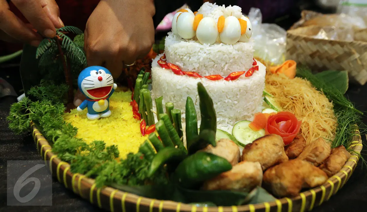 Salah satu bentuk tumpeng peserta saat mengikuti Lomba Menghias Tumpeng di Museum Nasional, Jakarta, Sabtu (22/4). Acara Lomba Menghias Tumpeng ini diikuti oleh 110 peserta. (Liputan6.com/Fery Pradolo)