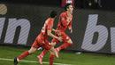 Gelandang Makedonia Utara, Eljif Elmas (kanan) melakukan selebrasi usai mencetak gol kedua Makedonia Utara ke gawang Jerman dalam laga lanjutan Kualifikasi Piala Dunia 2022 Zona Eropa Grup J di Duisburg, Jerman, Rabu (31/3/2021). Makedonia Utara mengalahkan Jerman 2-1. (AP/Thilo Schmuelgen/Pool)