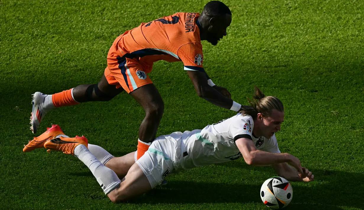 Sementara Belanda menduduki peringkat ketiga, dan mereak tetap lolos sebagai peringkat ketiga terbaik. (GABRIEL BOUYS / AFP)