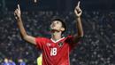 <p>Selebrasi striker Timnas Indonesia U-22, Titan Agung Fawwazi setelah mencetak gol pertama Timnas Indonesia U-22 ke gawang Kamboja pada laga keempat Grup A SEA Games 2023 di Olympic National Stadium, Phnom Penh, Kamboja, Rabu (10/5/2023). (Bola.com/Abdul Aziz)</p>