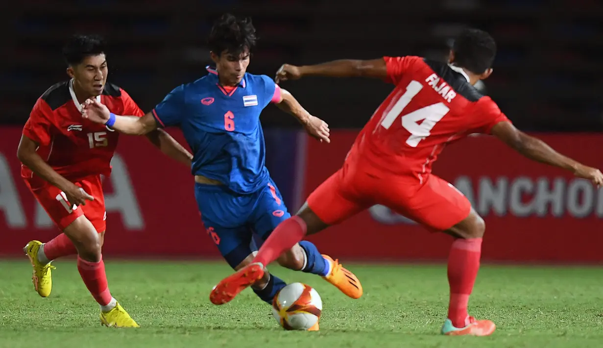 <p>Timnas Indonesia U-22 berhasil menutup perjalanan mereka di SEA Games 2023 dengan hasil yang manis. (Nhac NGUYEN / AFP)</p>
