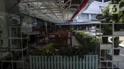 Suasana salah satu pusat perbelanjaan yang tutup di Jakarta, Minggu (8/8/2021). Pembebasan PPN atas jasa sewa kios, gerai, dan toko di pusat perbelanjaan dilakukan pemerintah untuk membantu dunia usaha yang terdampak penyesuaian aturan PPKM Level 4. (Liputan6.com/Johan Tallo)