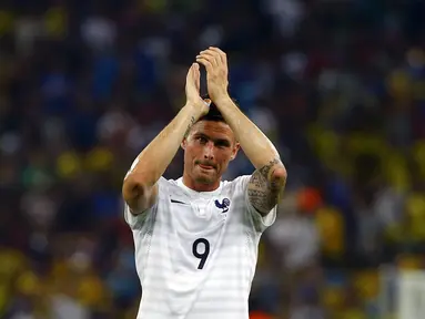 Ekspresi pemain depan Perancis, Olivier Giroud, saat ditahan imbang Ekuador 0-0 di Stadion Maracana, Rio de Janeiro, (26/6/2014). (REUTERS/Pilar Olivares)