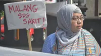 Aktivis antikorupsi di Kota Malang prihatin korupsi yang melibatkan DPRD Kota Malang dan Wali Kota Malang (Liputan6.com/Zainul Arifin)