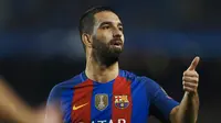 Pemain FC Barcelona, Arda Turan telah mencetak 3 gol selama ajang Copa Del Rey dan menempati urutan ke-5 bersama para pemain lainya yang bersaing menjadi top skor.  (EPA/Alejandro Garcia)