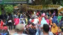 Suasana kepadatan pengunjung di dalam Ragunan, Jakarta, Minggu (25/12). Ragunan masih menjadi tempat favorit warga untuk mengisi libur panjang. (Liputan6.com/Helmi Afandi)