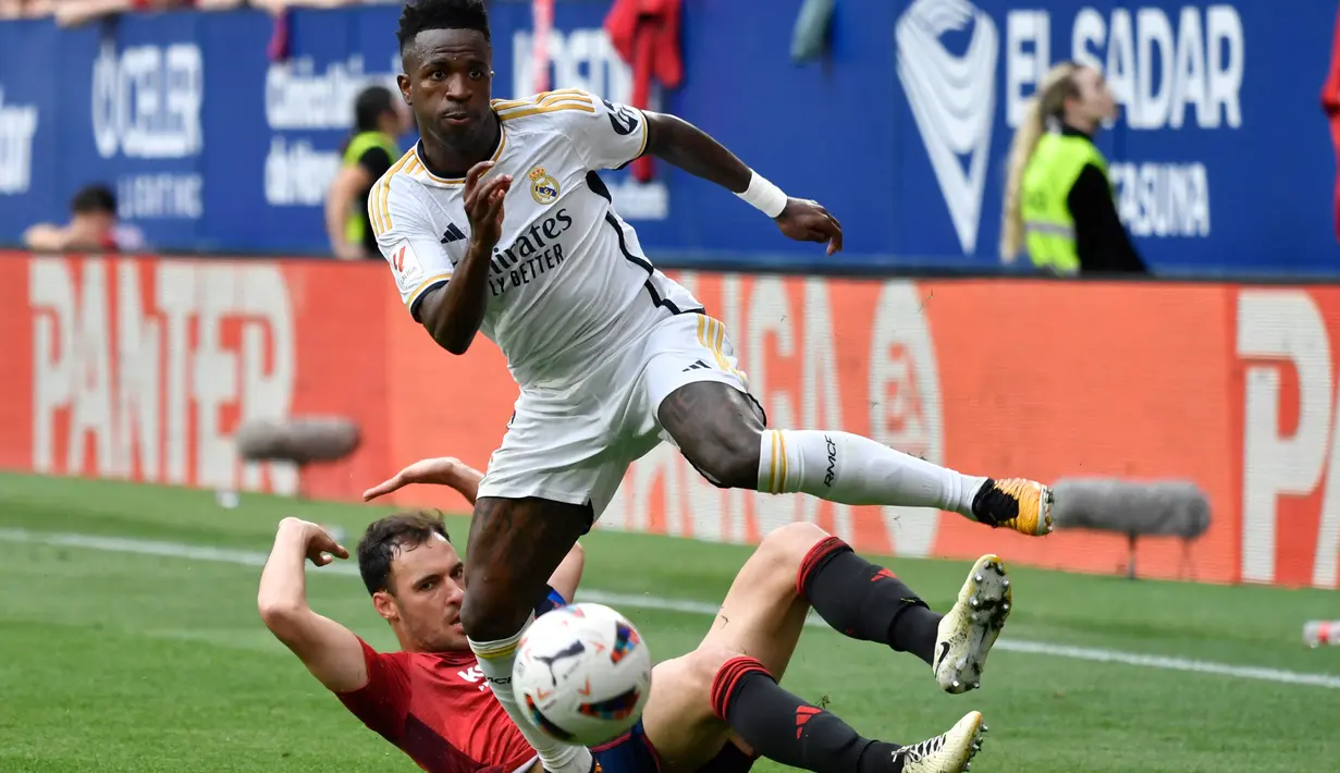 Vinicius Junior tampil impresif dengan mencetak dua gol untuk Los Blancos. (Ander Gillenea/AFP)
