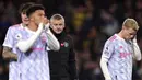 Reaksi Manajer Manchester United Ole Gunnar Solskjaer (tengah) dan pemain Manchester United Donny van de Beek (kanan) usai kalah dari Watford pada pertandingan sepak bola Liga Inggris di Vicarage Road, Watford, Inggris, 20 November, 2021. Watford menang 4-1. (AP Photo/Frank Augstein)