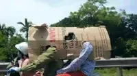 Uniknya Cara Orang Vietnam Hindari Sengatan Matahari  