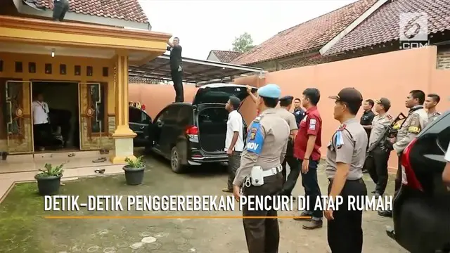 Seorang pencuri spesialis mobil ditangkap di atap rumahnya sendiri. Polisi terpaksa lepaskan tembakan peringatan agar pelaku tak kabur.