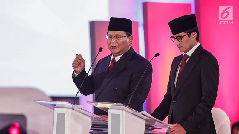Ekspresi Prabowo - Sandiaga Uno Saat Debat Pilpres 2019