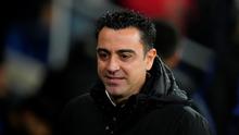 Pelatih Barcelona, Xavi Hernandez, memimpin timnya menghadapi Real Madrid pada laga pekan ke-29 La Liga di Santiago Bernabeu, Senin (21/3/2022) dini hari WIB. (AP Photo/Manu Fernandez)