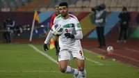 Timnas Iran bakal mengandalkan Mehdi Taremi di lini depan pada Piala Dunia 2022. (AFP/Atta KENARE)