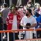 Presiden Joko Widodo, Menteri BUMN Erick Thohir, Gubernur Jawa Tengah Ganjar Pranowo, dan Wali Kota Surakarta Gibran Rakabuming Raka di Solo Car Free Day (CFD), Surakarta, Minggu (7/8/2022). (Dok BUMN)