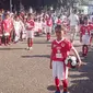 Ribuan peserta nampak antusias mengikuti jalannya pencatatan rekor dunia menggiring bola terbanyak di Garut (Liputan6.com/Jayadi Supriadin)
