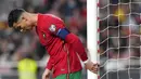 Reaksi pemain Portugal Cristiano Ronaldo saat melawan Serbia pada pertandingan kualifikasi Grup A Piala Dunia 2022 di Stadion Luz, Lisbon, 14 November 2021. Serbia menang 2-1. (AP Photo/Armando Franca)