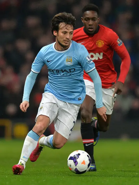 <p>Silva memenangi sejumlah trofi, yang termasuk Piala Dunia 2010 dan dua Piala Eropa (Euro) bersama Timnas Spanyol. Sedangkan dia juga meraih dua Copa del Rey, pertama saat bermain bersama Valencia pada 2008 dan trofi terakhirnya bersama Sociedad pada 2020. (PAUL ELLIS/AFP)</p>