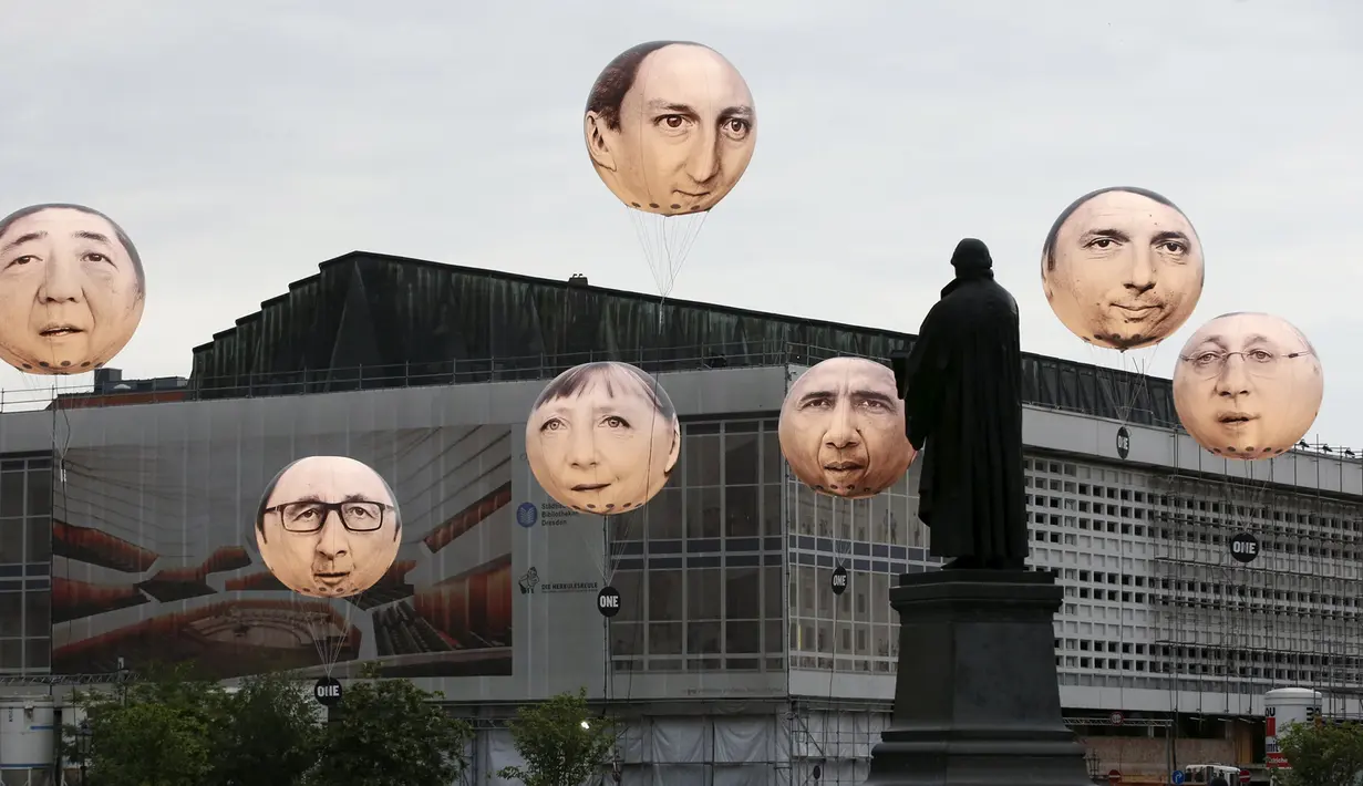 Balon yang menggambarkan wajah pemimpin negara anggota G7 menghiasi kota Dresden, Jerman, (27/5/2015). Kanselir Jerman Angela Merkel mengatakan, tak terbayangkan bila Rusia berpartisipasi dalam pertemuan G7. (REUTERS/Fabrizio Bensch)