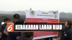 Sebuah patok dipasang di sebuah lahan seluas lebih dari empat hektar yang dikelola oleh perusahaan berinisial AD.