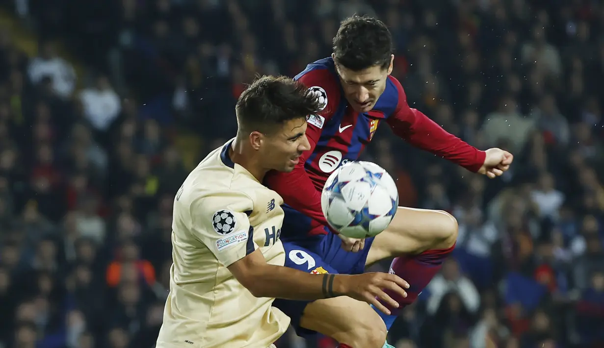 Kemenangan ini membuat anak asuh Xavi dipastikan melaju ke fase knockout Liga Champions dengan sisa satu pertandingan. (AP Photo/Joan Monfort)