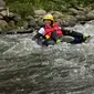 Longalo River Tubing di Desa Longalo, Kabupaten Bone Bolango, Gorontalo, adalah wisata olahraga air yang menguji adrenalin. (Arfandi Ibrahim/Liputan6.com)