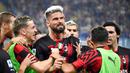 Pemain AC Milan Olivier Giroud (tengah) melakukan selebrasi usai mencetak gol ke gawang Sampdoria pada pertandingan sepak bola Serie A Liga Italia di Genova, Italia, 10 September 2022. AC Milan menang dengan skor 2-1 atas Sampdoria. (Tano Pecoraro/LaPresse via AP)