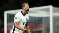Pemain Inggris, Harry Kane merayakan golnya ke gawang Finlandia saat laga UEFA Nations League 2024 di Satdion Wembley, London, Rabu (11/09/2024) WIB. (AP Photo/Frank Augstein)