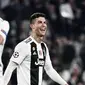 Cristiano Ronaldo selepas Juventus lolos ke perempat final Liga Champions 2018-2019 di Allianz Stadium, Rabu dini hari WIB (13/3/2019). (AFP/Marco Bertorello)