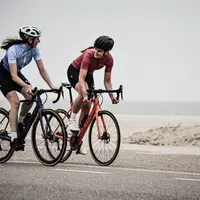 ilustrasi orang bersepeda ketempat kerja. (Foto: Unsplash/Coen van de Broek)