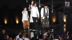 Wakil Presiden terpilih 2019-2024, KH Ma’ruf Amin (kanan) bersama Presiden RI terpilih 2019-2014, Joko Widodo jelang pidato Visi Indonesia di SICC, Sentul, Kab Bogor, Jawa Barat, Minggu (14/7/2019). KH Ma’ruf Amin menutup pidato dengan doa bagi bangsa.  (Liputan6.com/Helmi Fithriansyah)