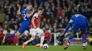<p>Kemenangan besar ini menjadikan Arsenal masih kokoh di puncak klasemen Liga Inggris dengan perolehan 77 poin, atau unggul 3 poin dari Liverpool di posisi 2. (AP Photo/Kin Cheung)</p>