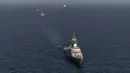 Para pelaut berlatih membebaskan kapal yang ditawan hingga memberi bantuan kepada kapal yang kesulitan. Hasil latihannya akan disimpulkan pada 18 Maret 2023. (Iranian Army office/AFP)