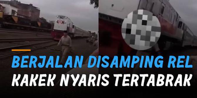 VIDEO: Berjalan di Samping Rel, Seorang Kakek Nyaris Tertabrak Kereta Api