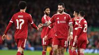 Kemenangan ini sekaligus mengamankan tiket The Reds ke putaran keempat Piala FA Inggris dan dijadwalkan bertemu sesama klub Premier League, Brighton & Hove Albion pada 14 Februari 2026. Tampak dalam foto, gelandang Liverpool asal Hungaria, Dominik Szoboszlai (kanan) merayakan golnya saat pertandingan putaran ketiga Piala FA Inggris melawan Barnsley di Stadion Anfield, pada Senin 12 Januari 2026 waktu setempat atau Selasa (13/1/2026) dini hari WIB. (PETER POWELL/AFP)