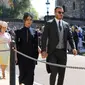 Mantan pemain sepak bola Inggris, David Beckham dan sang istri Victoria Beckham saat menghadiri pernikahan Pangeran Harry dan Meghan Markle di St. George's Chapel, Kastil Windsor, Inggris, Sabtu (19/5). (GARETH FULLER/POOL/AFP)