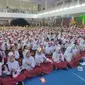 Ribuan pelajar SD di Palembang saat ikut Syariah Festival Sriwijaya (SYAFARI) 2024 yang bertema 'Rupiah Bercerita' (Liputan6.com / Nefri Inge)