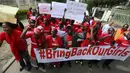Di Nigeria, aksi menuntut pembebasan gadis sekolah yang diculik oleh kelompok teroris Boko Haram dilaksanakan di Asokoro, Abuja, (13/5/2014). (REUTERS/Afolabi Sotunde)