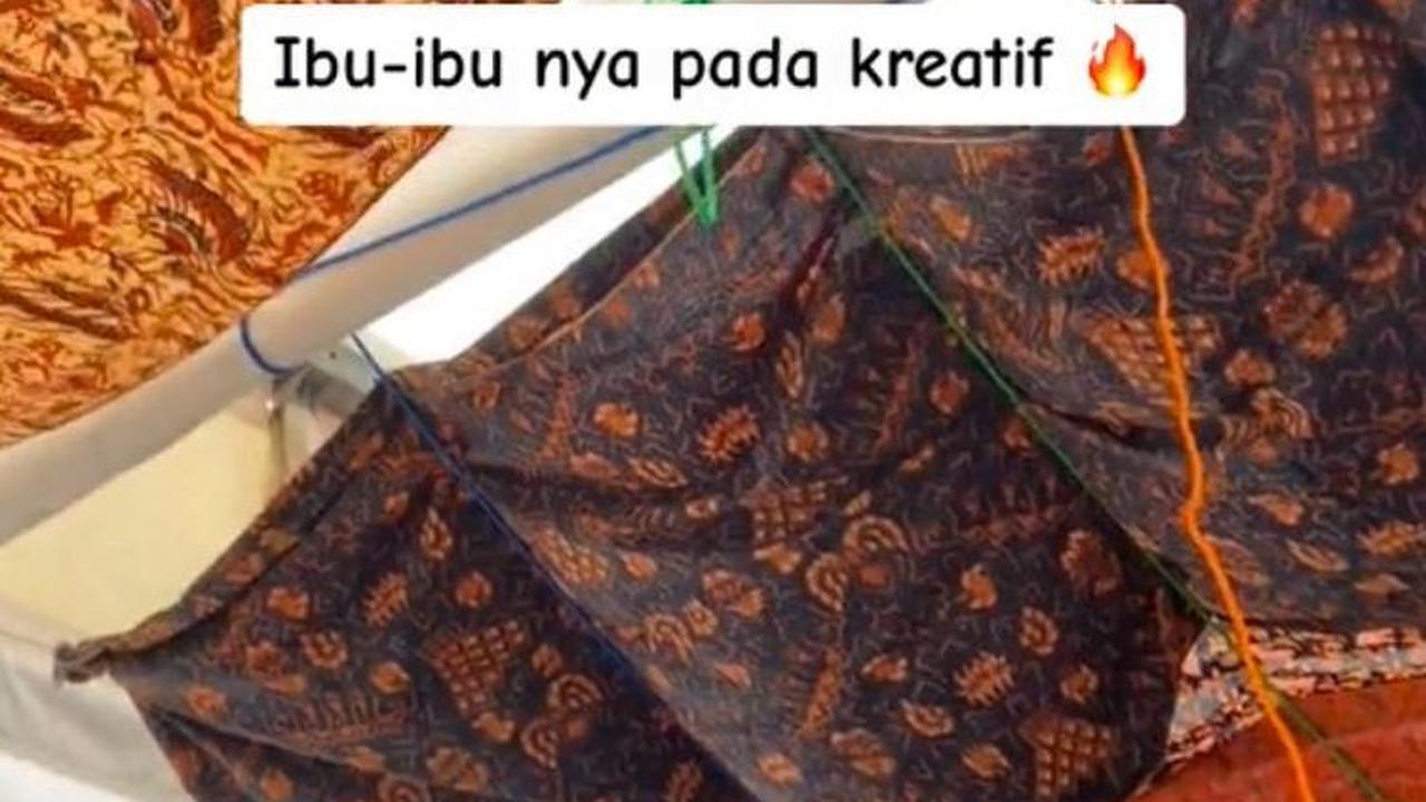 Beginilah potret kain-kain jarik yang dipasang di bagian dalam tenda agar panas tak langsung mengenai mereka.