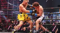 Youtuber Jake Paul menang KO saat bertarung melawan Ben Askren di di Mercedes-Benz Stadium, Atlanta, Georgia, 17  April 2021  (Al Bello/ AFP)