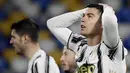 Striker Juventus, Cristiano Ronaldo, tampak kecewa usai gagal mencetak gol ke gawang Napoli pada laga Liga Italia di Stadion Diego Maradona, Sabtu (13/2/2021). Juventus takluk 1-0 dari Napoli. (Photo by Filippo MONTEFORTE / AFP)