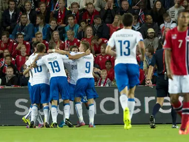 Timnas Italia sukses menumbangkan Norwegia 2-0 di laga kualifikasi Piala Eropa grup H 2016 di Stadion Ullevaal, Oslo, (10/9/2014). (AFP PHOTO/Fredrik Varfjell)